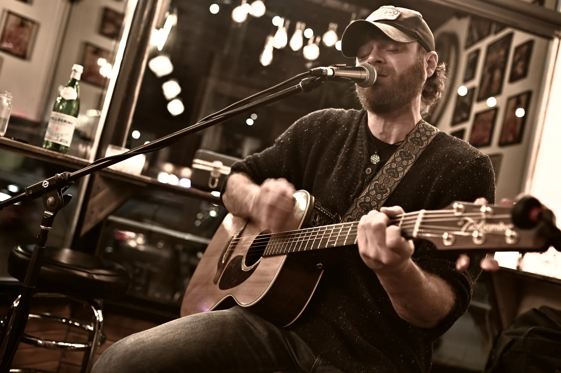 Jake performing at the mic